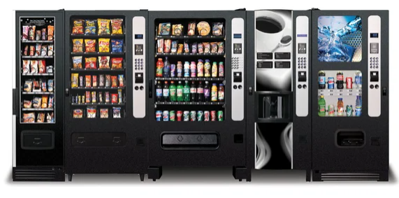 Sleek AI vending machine with touchscreen in a modern office lobby